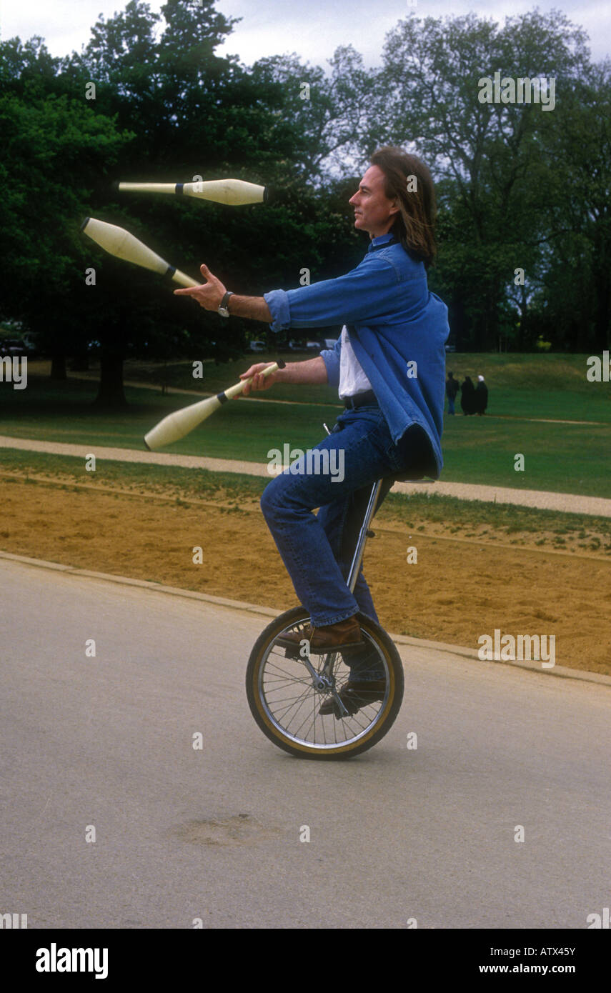 Juggling on a unicycle hires stock photography and images Alamy