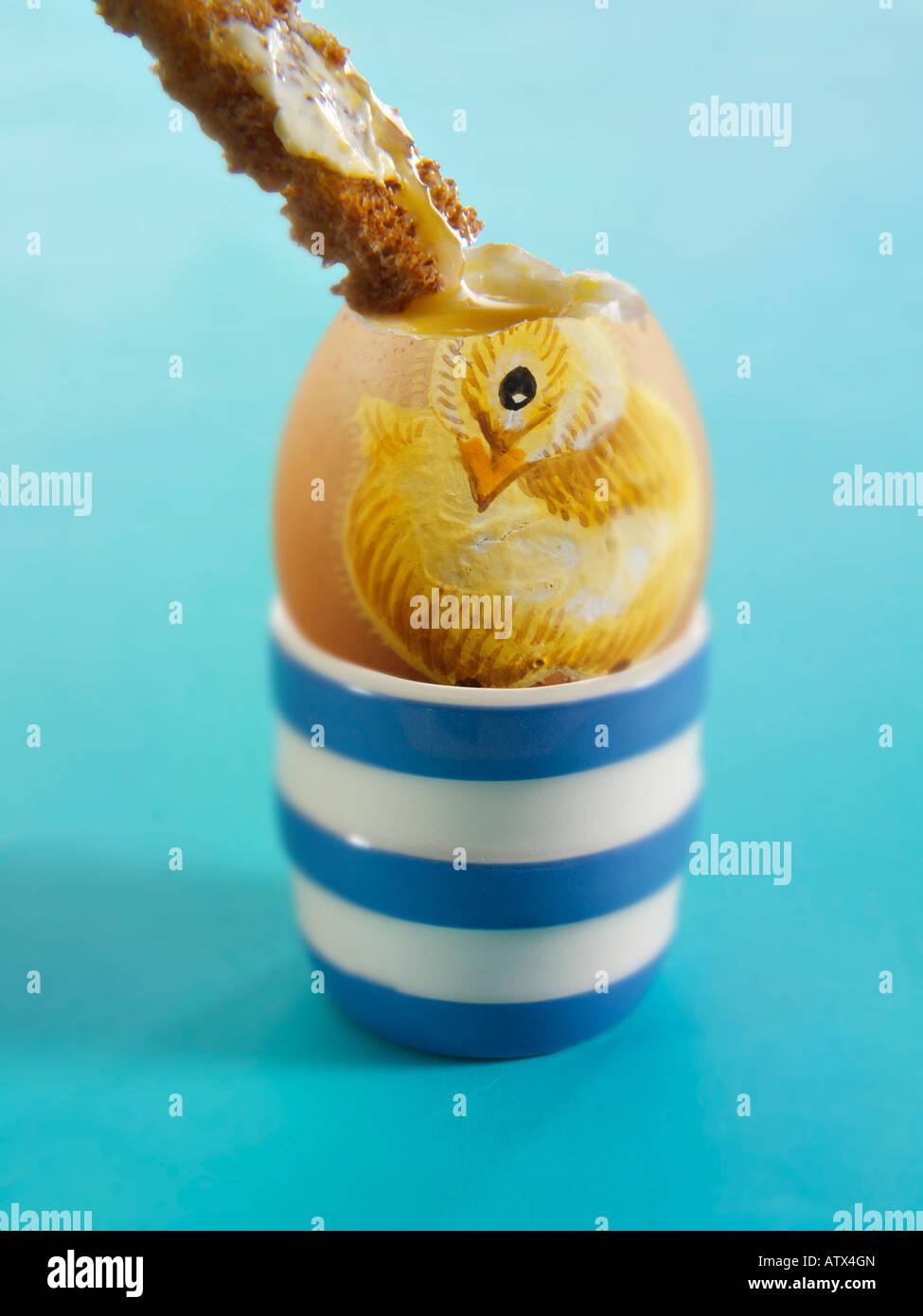Painted Easter Egg with a Chick illustration, soft Focus. Boiled egg with soldier Stock Photo