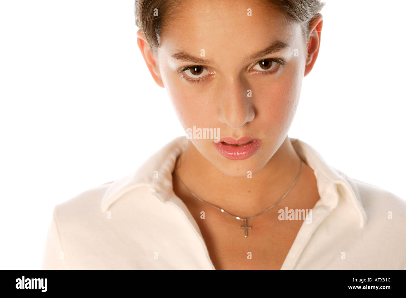 Young woman 18, 19, 20, 21, years old wearing cross necklace Stock Photo
