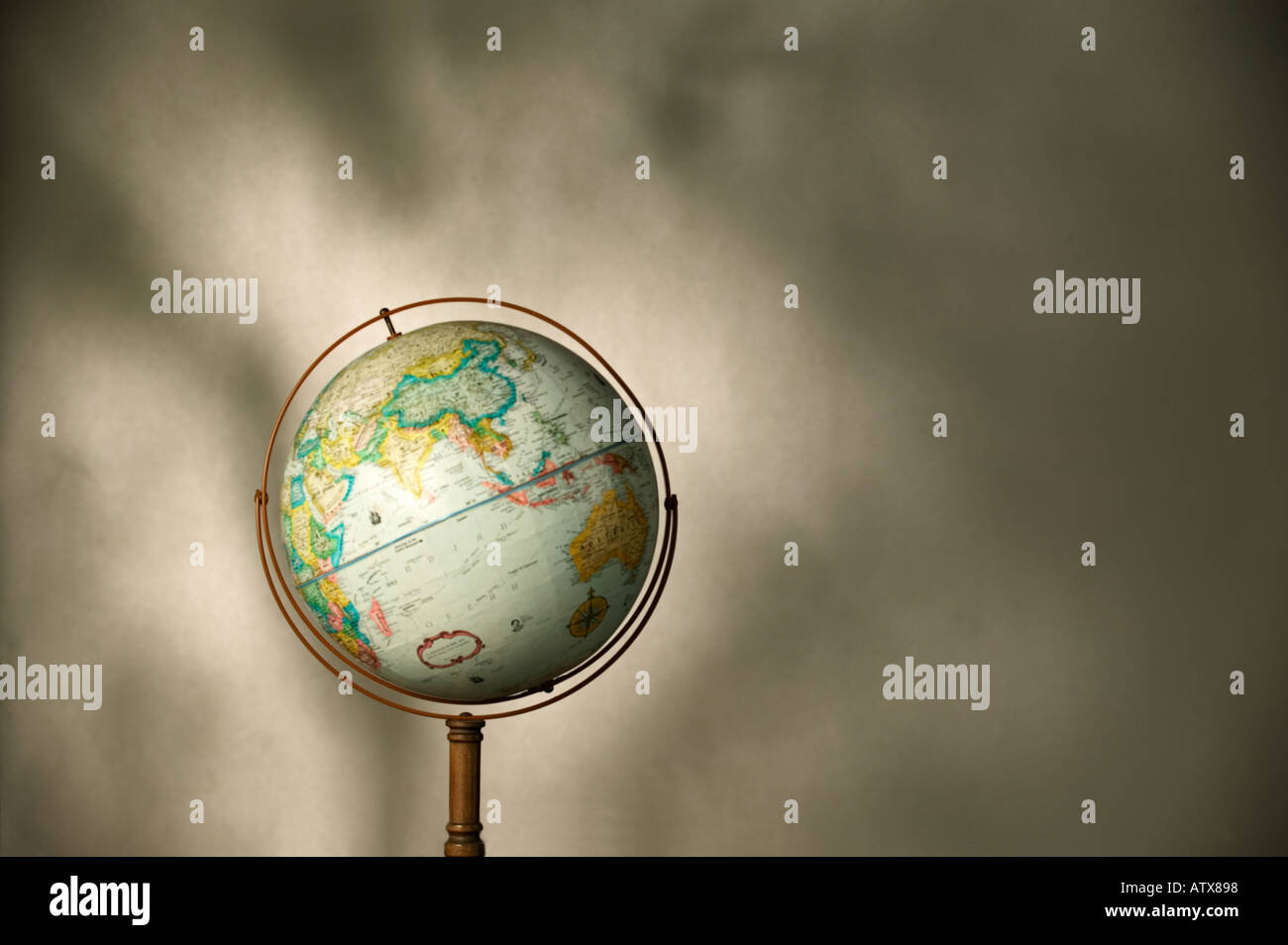 Still life of a globe on the muted background Stock Photo