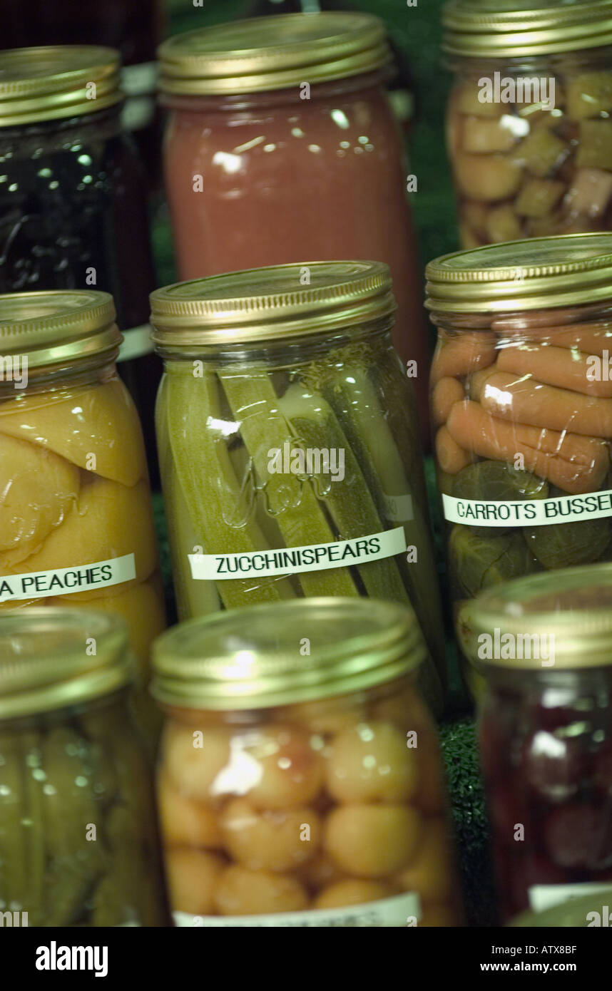 The life of stacks of mason jars with home canned fruits and vegetables