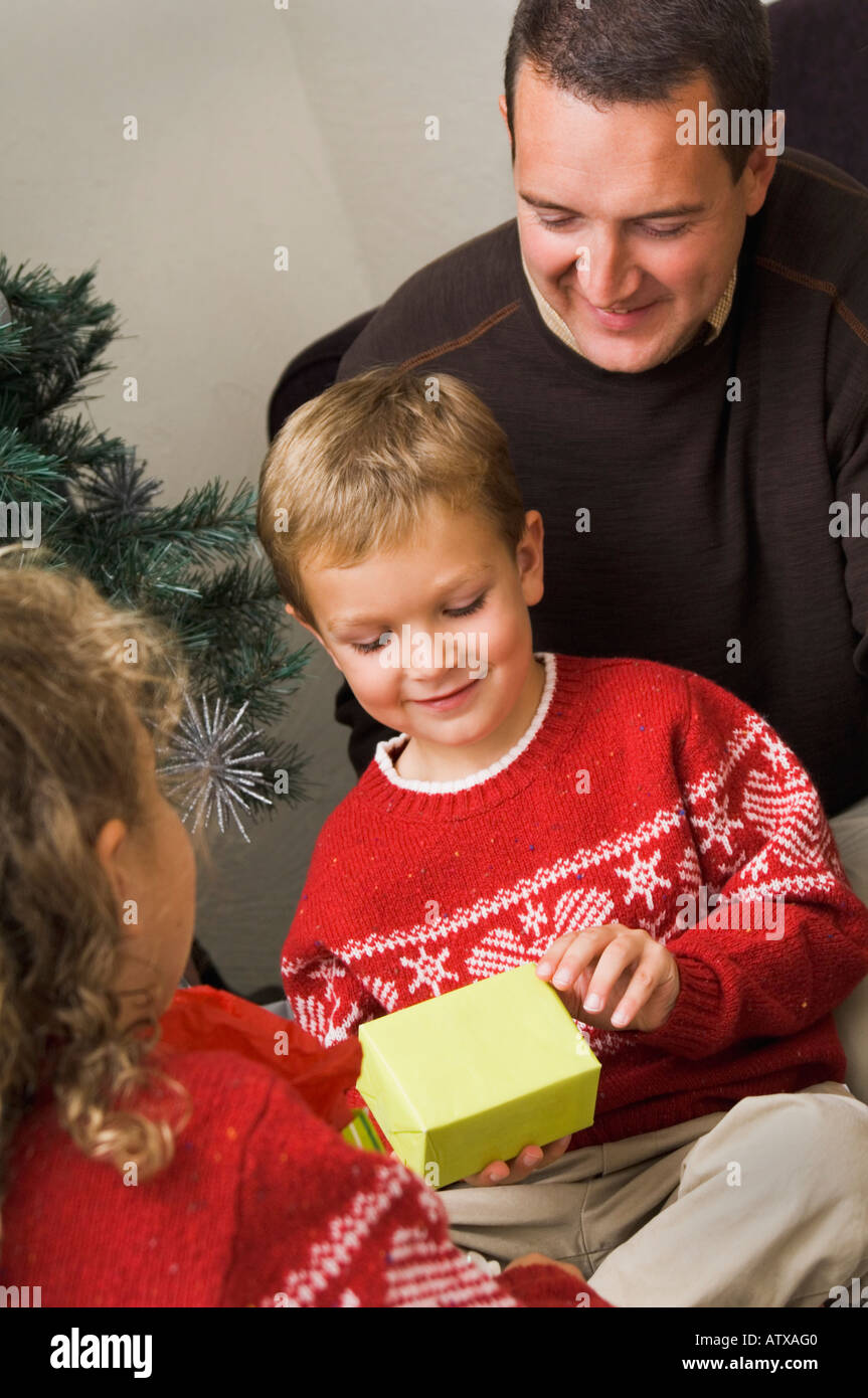 Family opening Christmas gifts Stock Photo