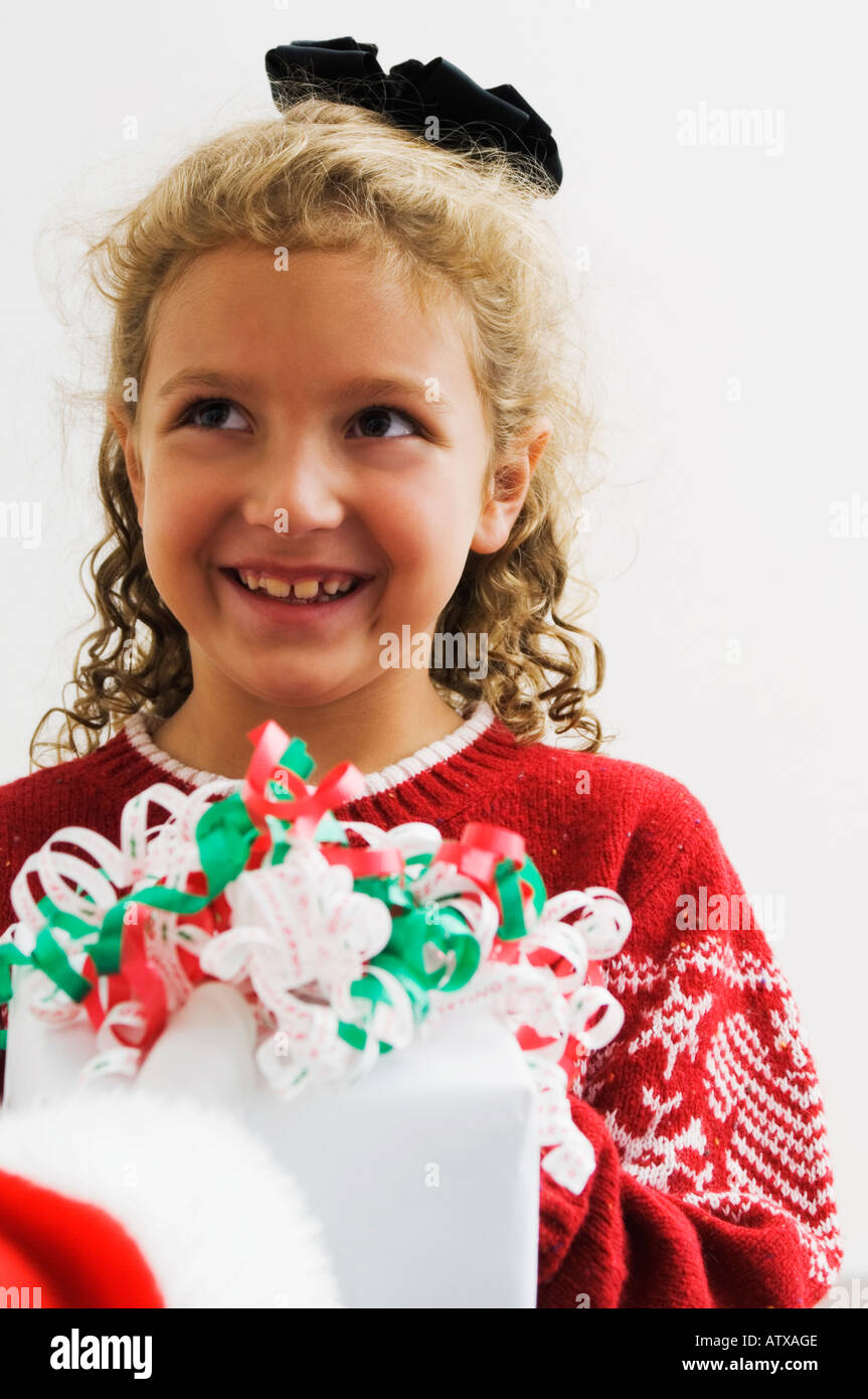 Girl Getting Gift From Santa Stock Photo - Alamy