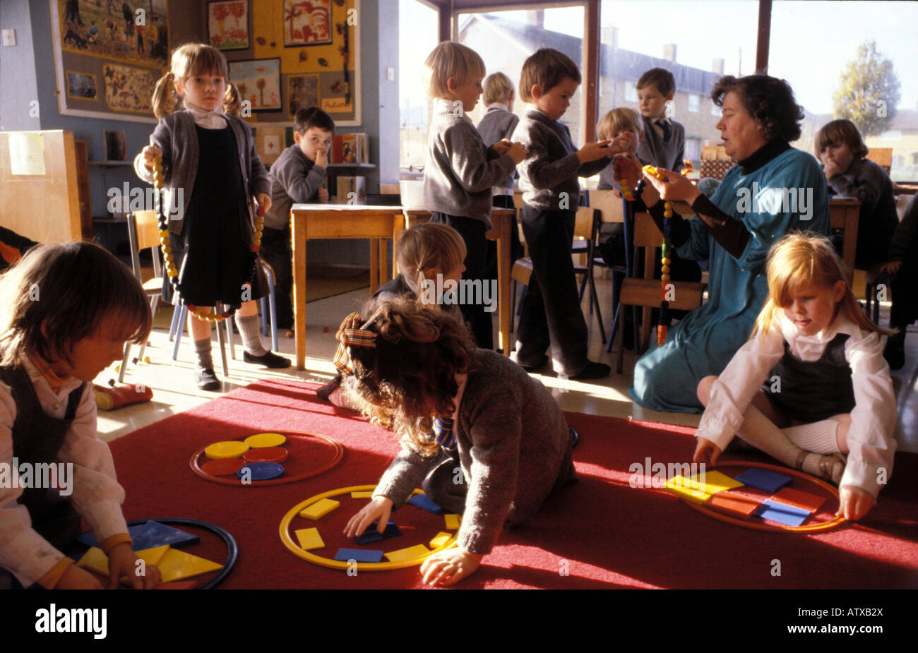 An active primary school multi tasking and learning through play activities Stock Photo