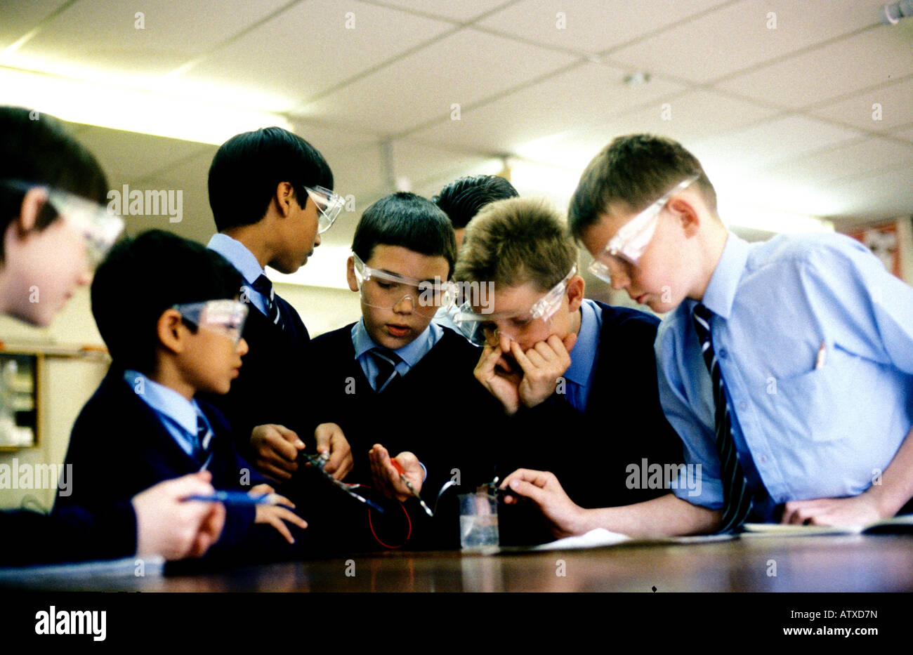 Secondary school children performing a science experiment at a CTC