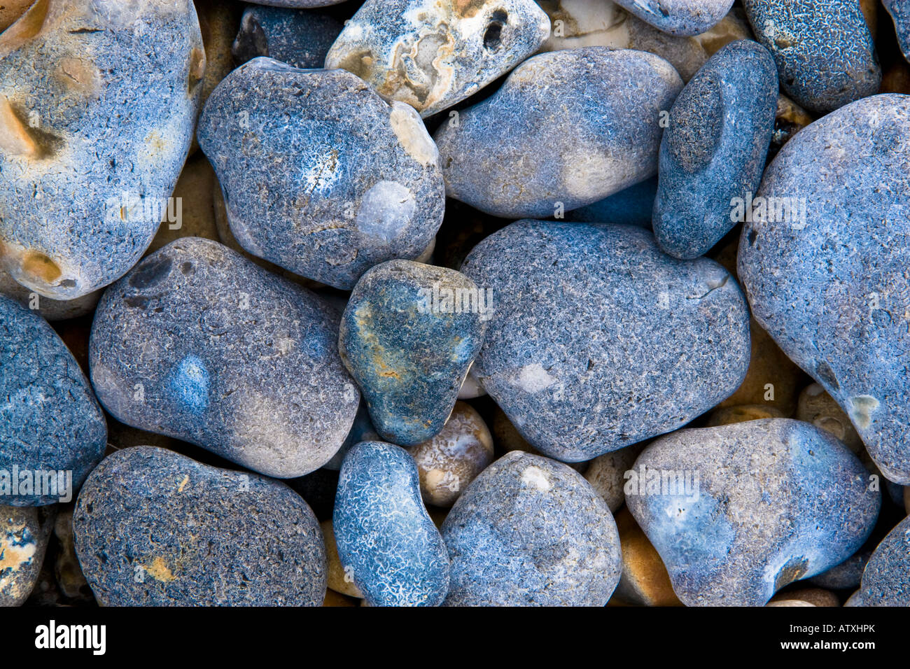 Blue Pebbles on a Beach. England Stock Photo