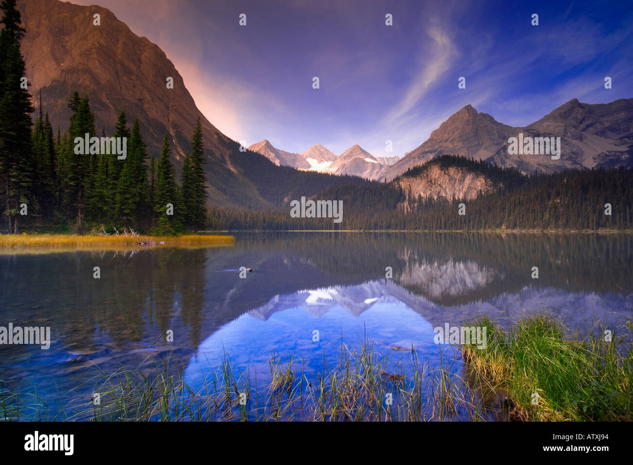 Sunrise on mountain lake, Elk Lakes Provincial Park, British Columbia, Canada Stock Photo Alamy