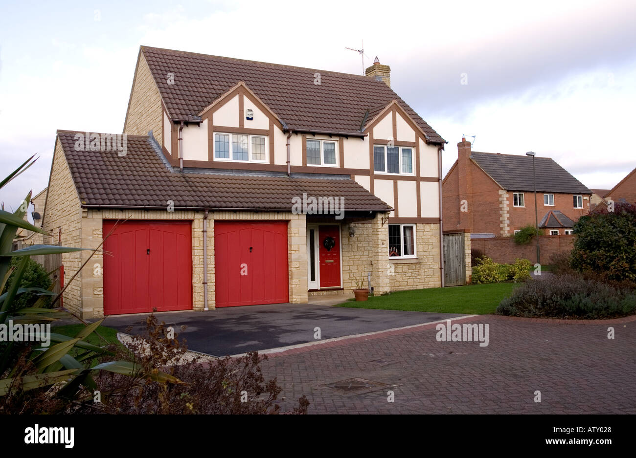 Large detached house with double garage in bradstone Cotswolds UK Stock Photo