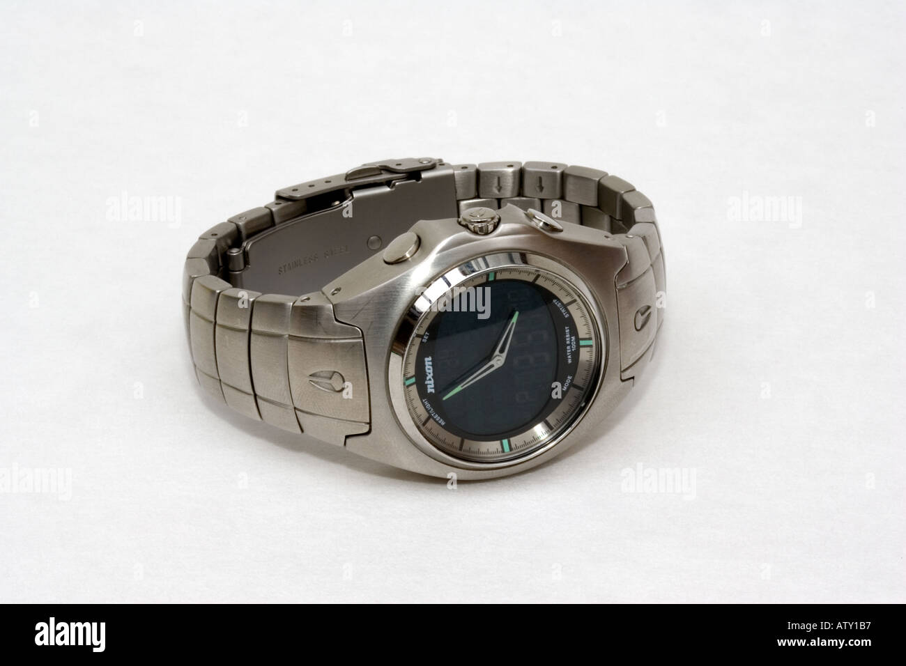 Nixon Super Hero stainless steel watch used by surfers and Nixon Super Hero stainless steel watch used by surfers and
