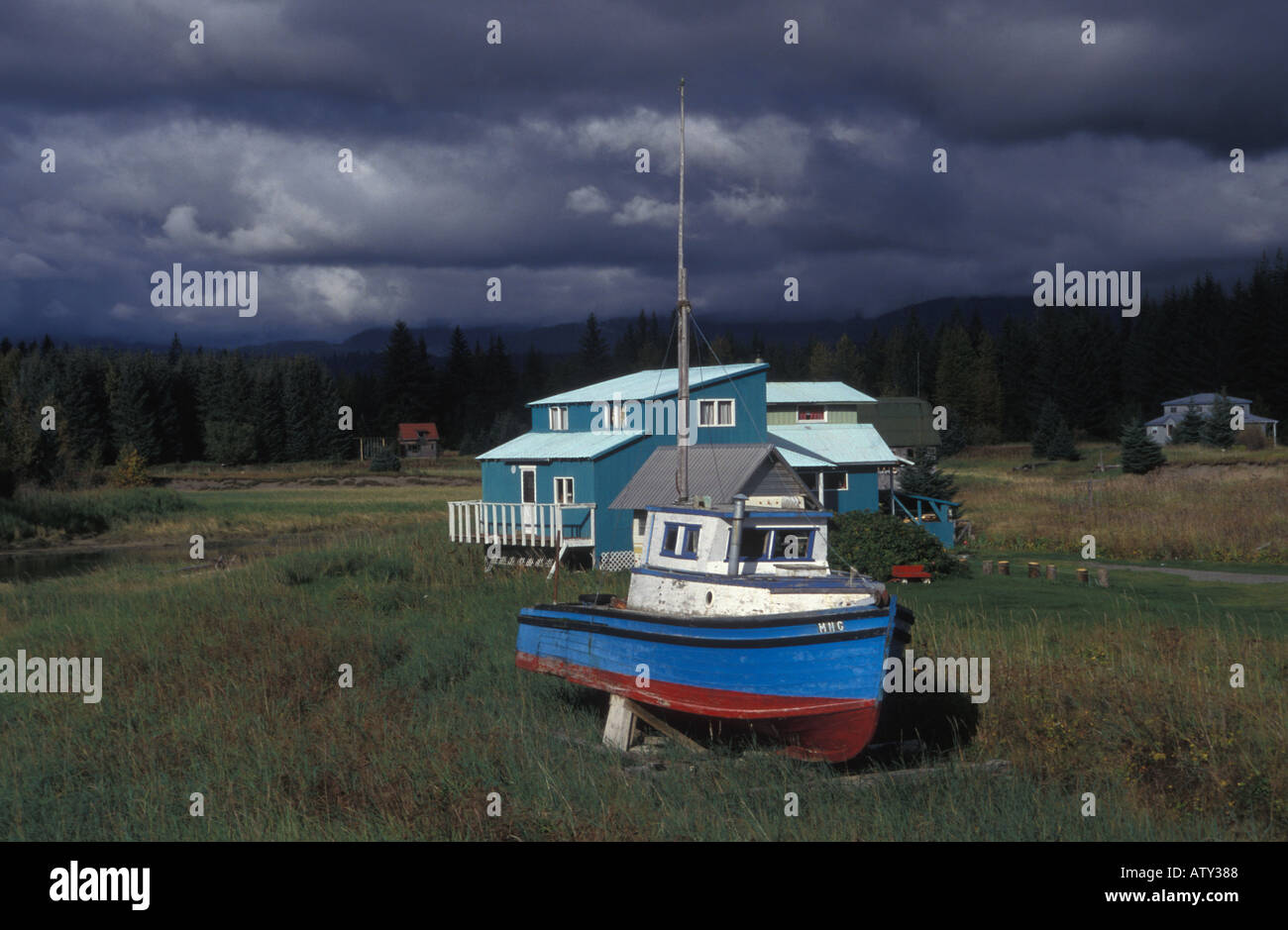 Boat and house near Gustavus Glacier Bay Alaska USA Stock Photo