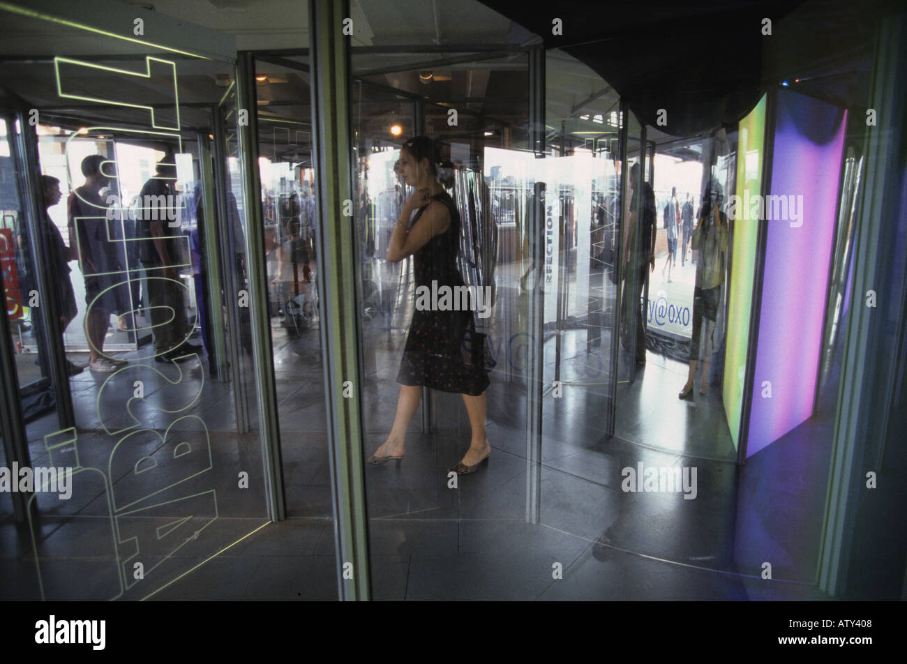 woman at entrance to exhibition, South Bank, London England, UK Stock Photo