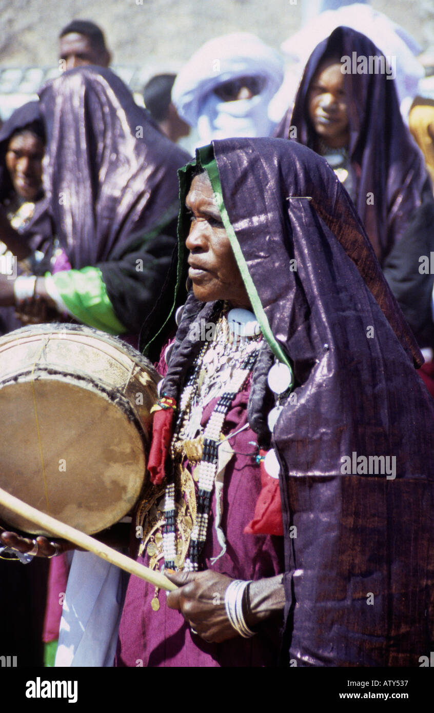 Sahara Desert Tuareg women dressed in waxed indigo robes at Sebiba