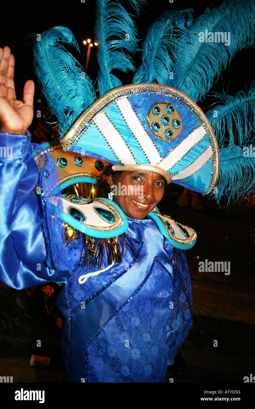 Close up portrait of smiling lady carnival dancer in blue head dress costume, Rio de Janeiro, Brazil, South America Stock Photo