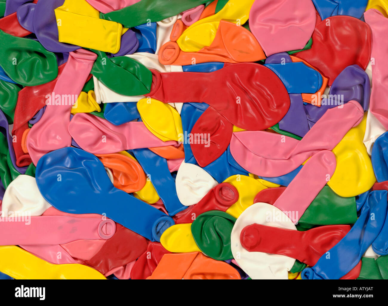 Balloons flattened under a sheet of glass Stock Photo