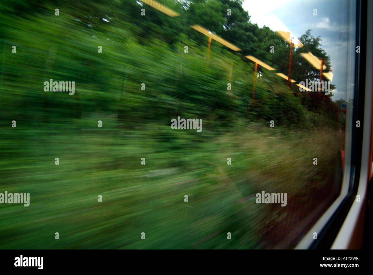 view out of a window of a speeding train Stock Photo Alamy
