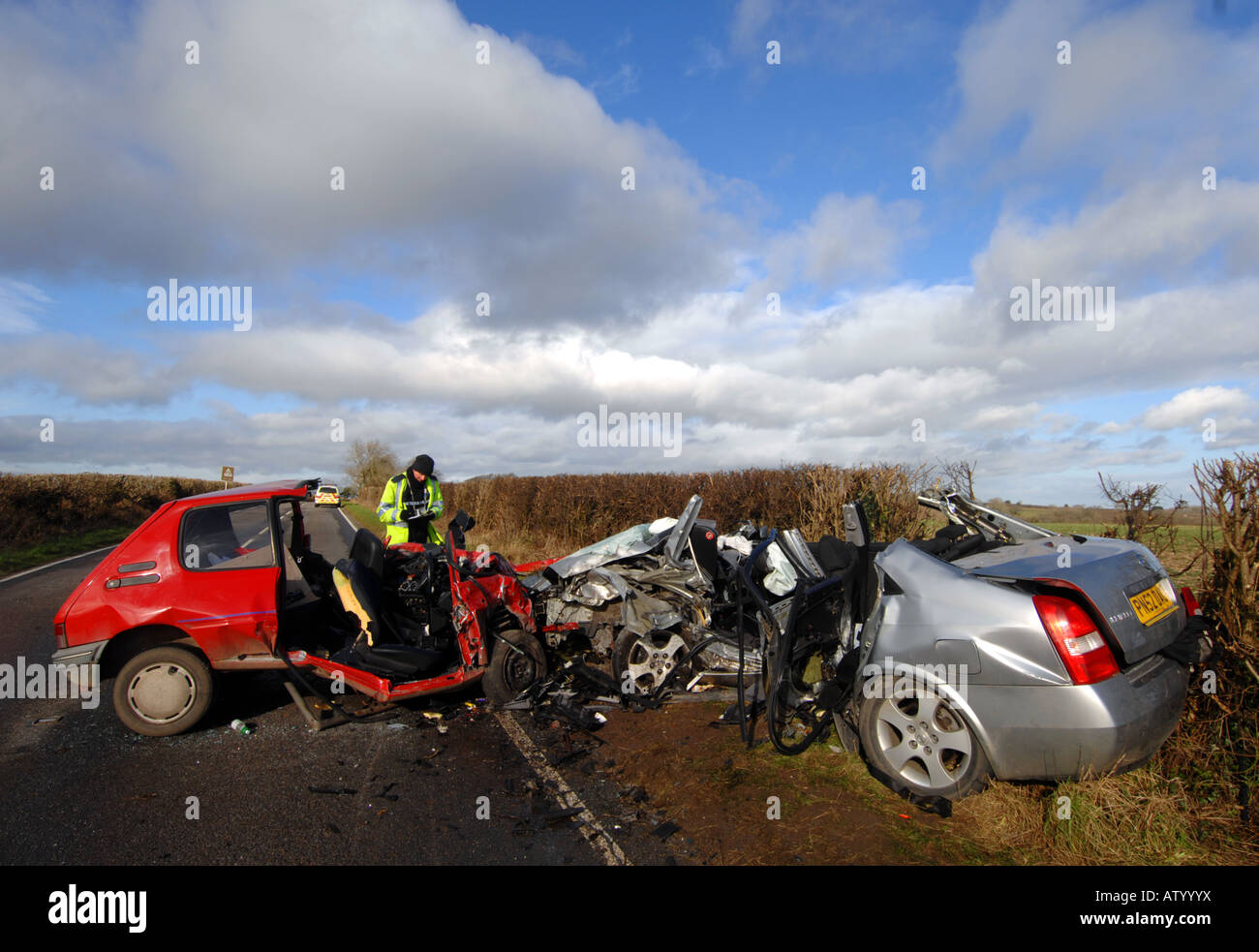 Police at the scene of a fatal head on car crash that killed 4 people Stock Photo