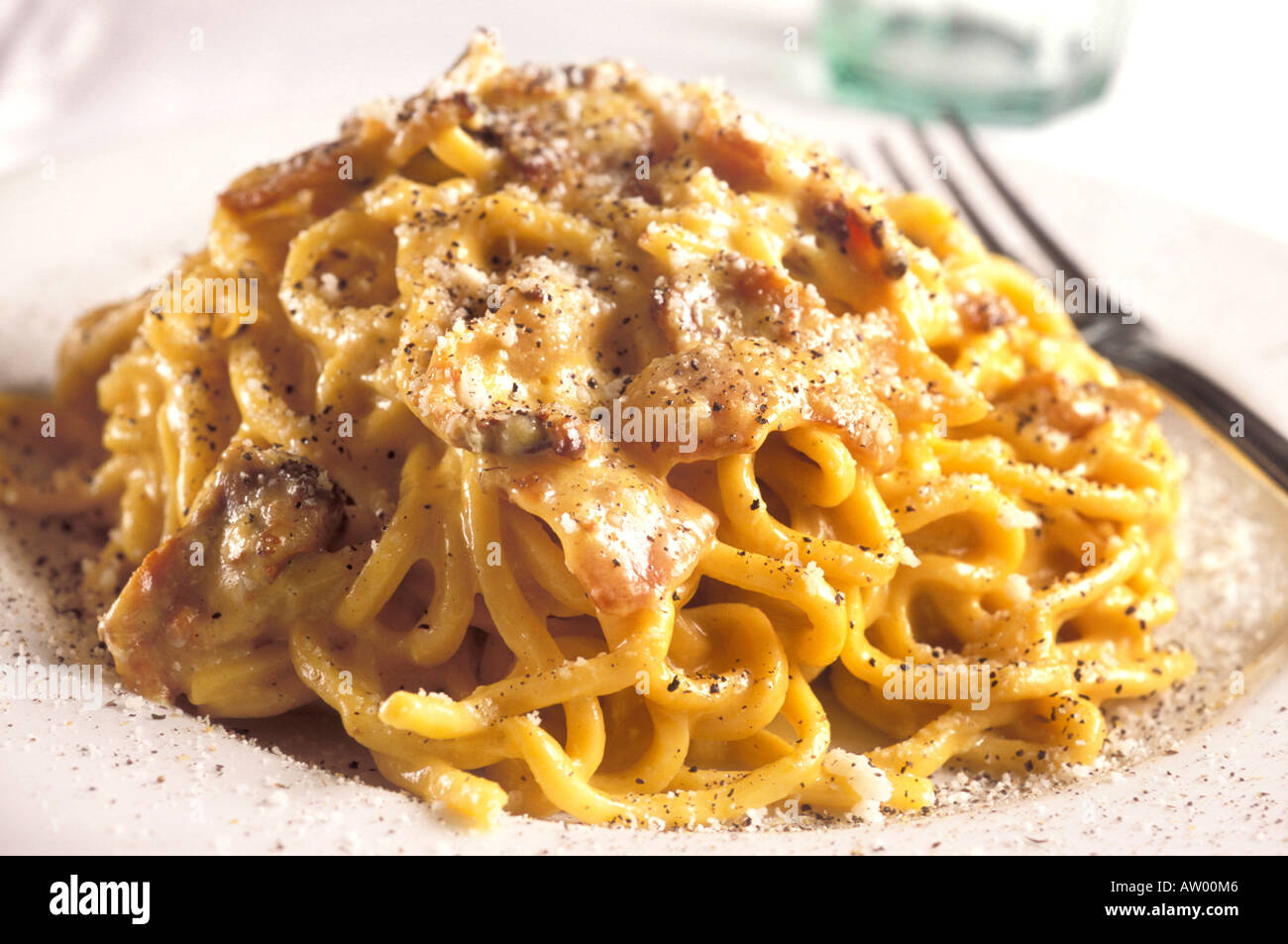 Tonnarelli pasta with Carbonara condiment Maccheroni restaurant Rome Lazio Italy Stock Photo