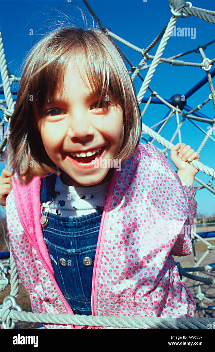Happy Little Girl Playing in the Park Stock Photo - Alamy