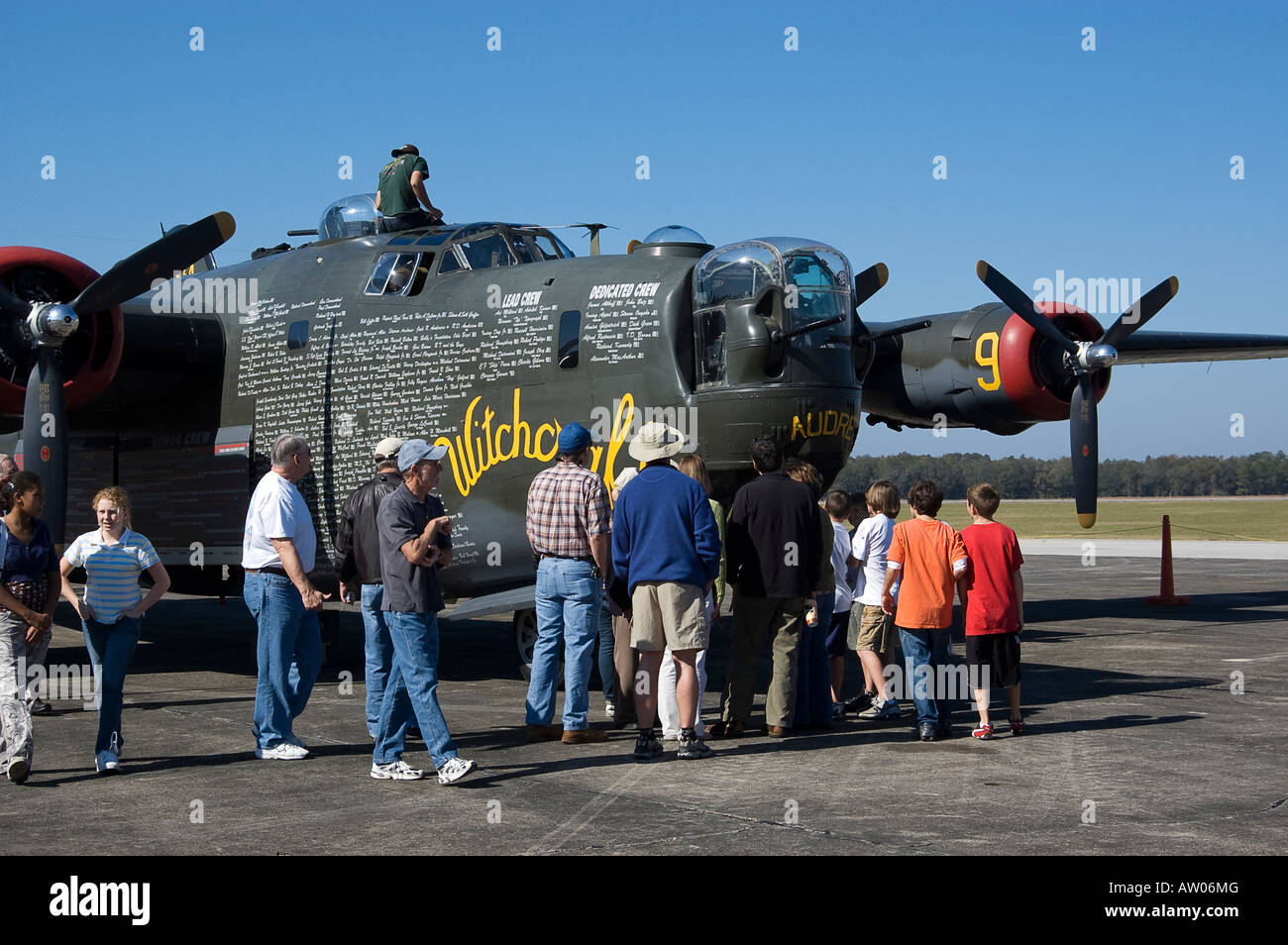 visitors at Wings of Freedom Tour looking at B 24 Liberator of World ...