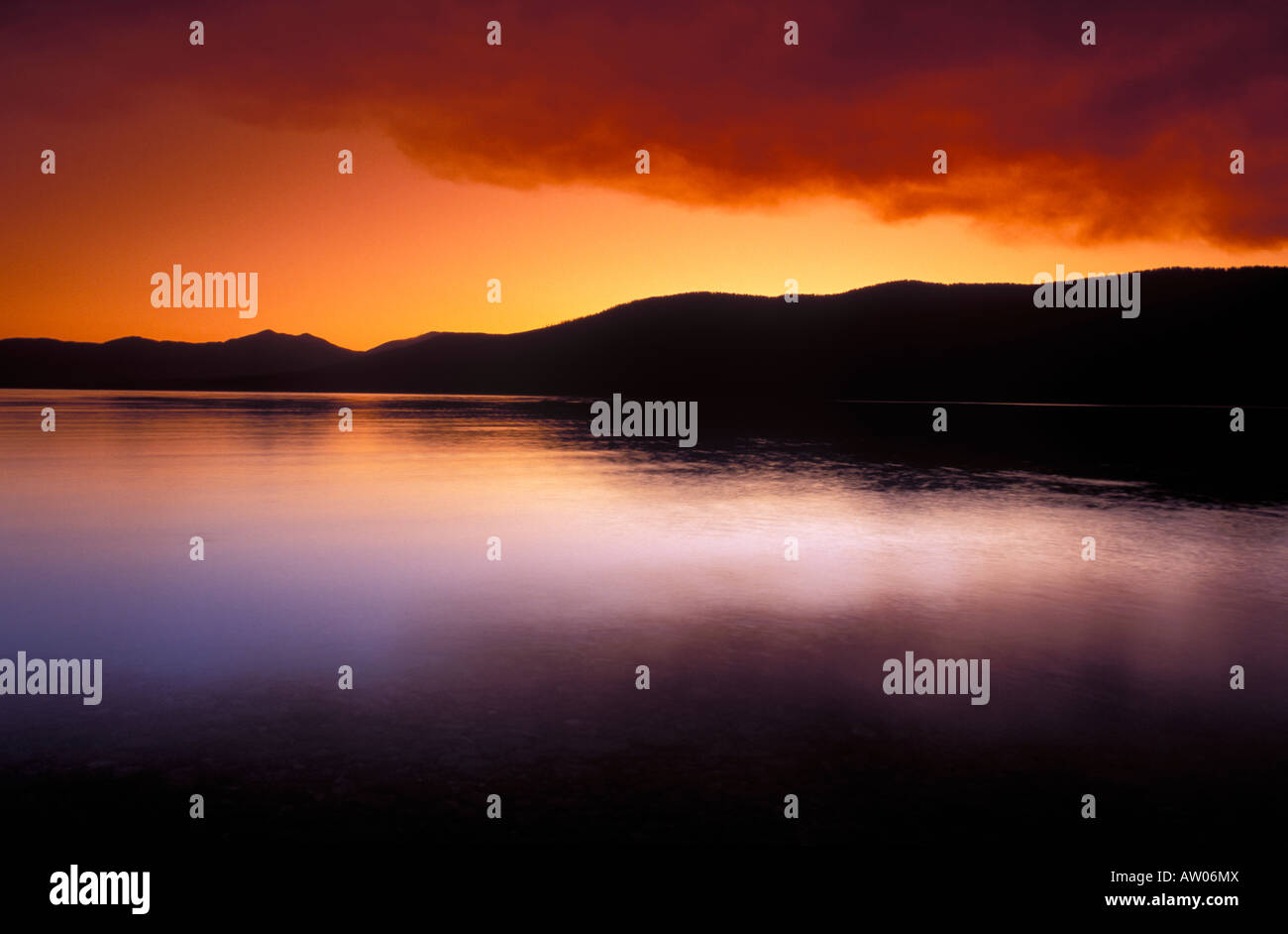 Smokey sunset over Lake McDonald Glacier National Park Montana Stock Photo