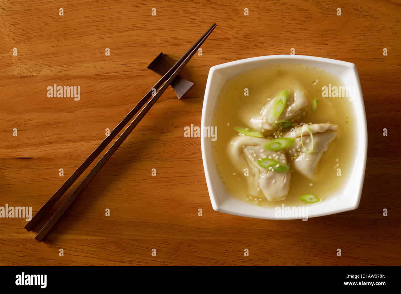 Wonton soup with chopsticks Stock Photo Alamy