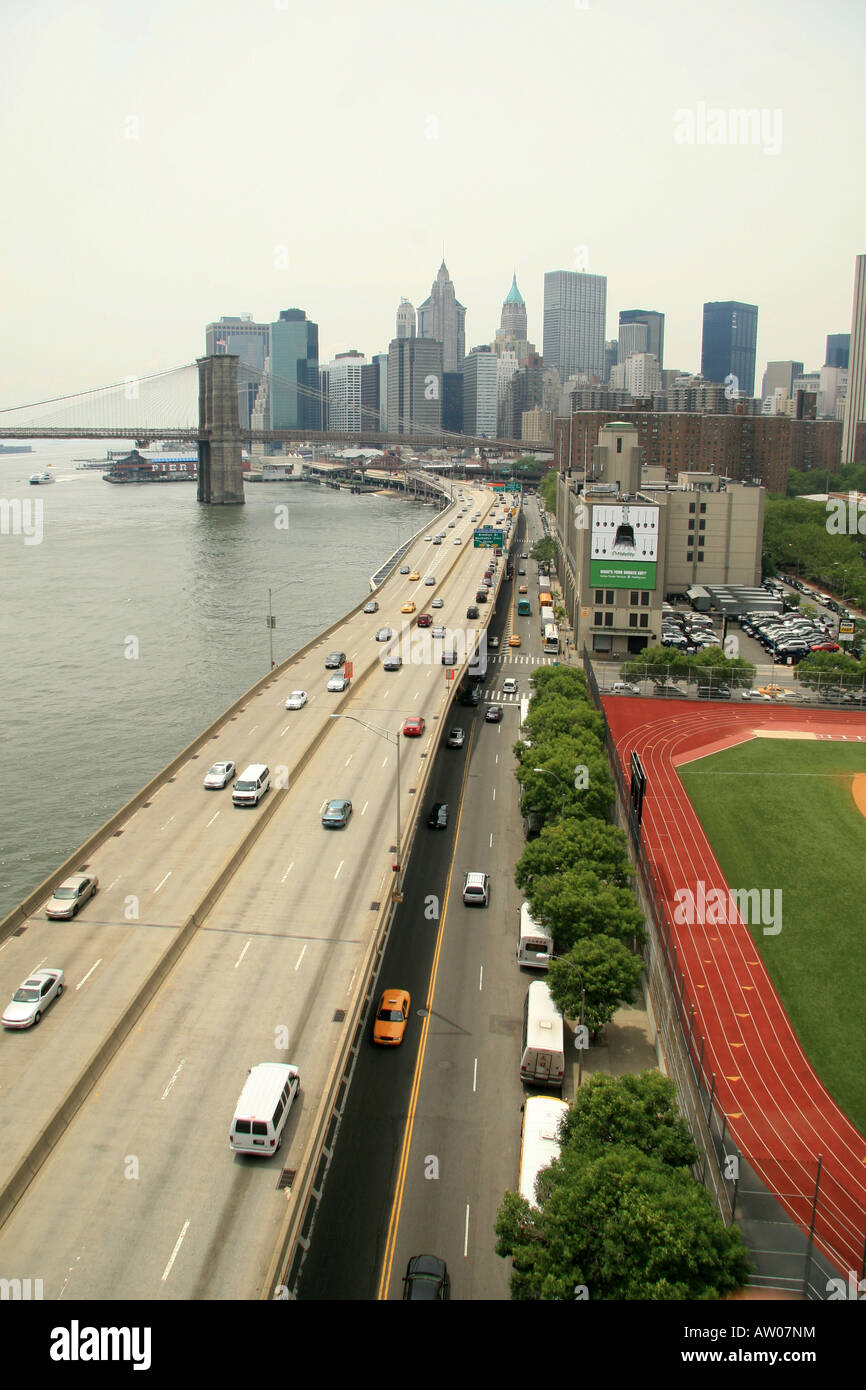 View of lower Manhattan, Franklyn D Roosevelt Drive and South Street from the Manhattan Bridge walkway, New York. Stock Photo