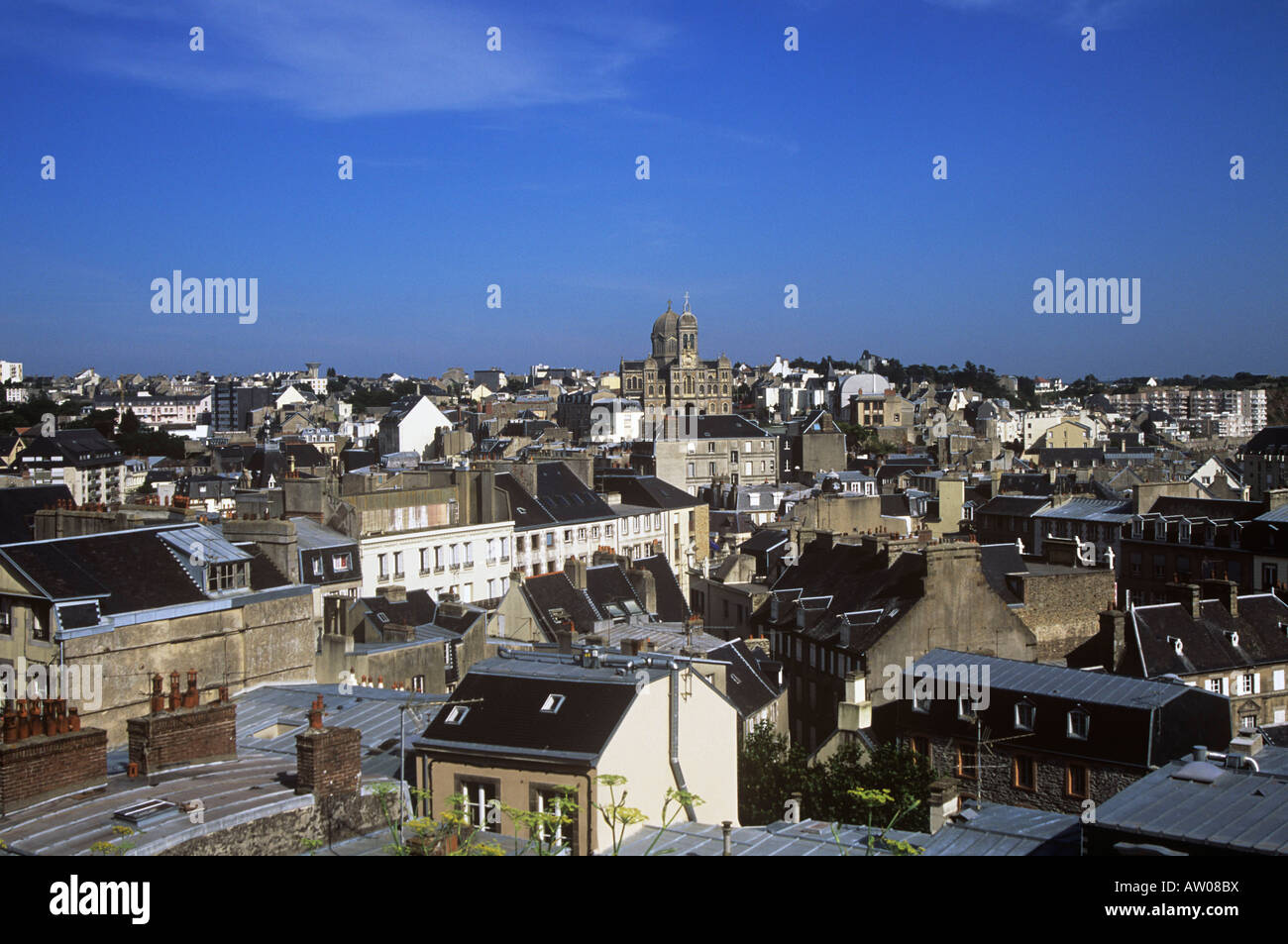 Roofscape of the town of Granville with the church of Notre Dame in the background, Normandy Stock Photo