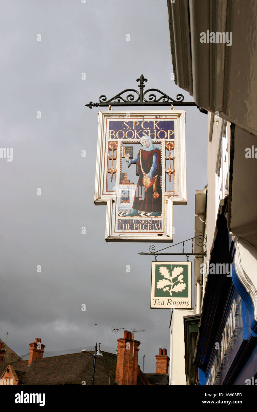 Ornate sign outside S P C K bookshop Goodramgate York Colours picked out against a heavy sky Stock Photo