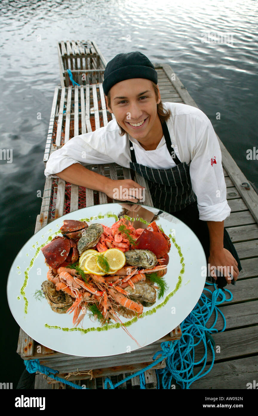 Chef at Hendelsman Flink Hotel Holding Fresh Seafood Platter, Flaton, Sweden Stock Photo