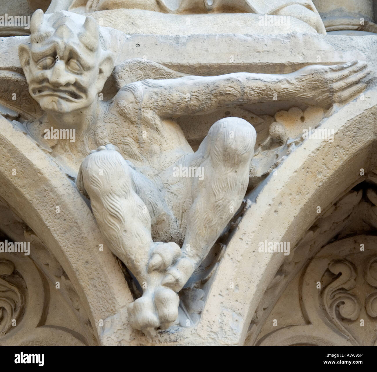 Gargoyle on facade of Notre Dame Paris France Stock Photo