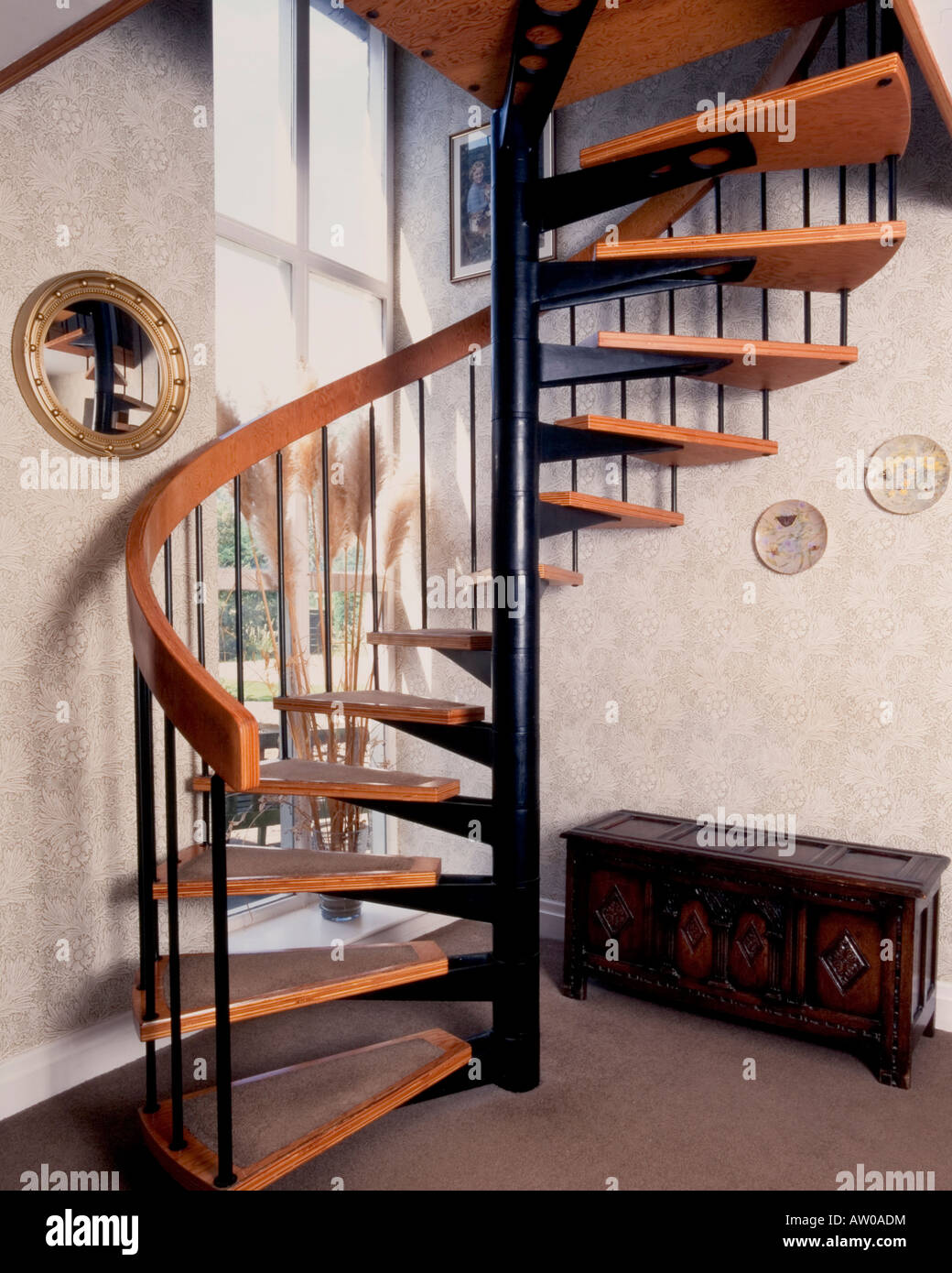 Domestic interior, modern style spiral staircase Stock Photo - Alamy