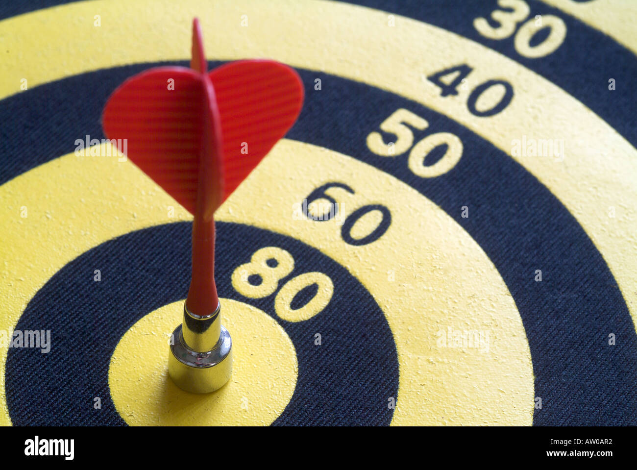 still life of dart board with bull s eye score Stock Photo Alamy