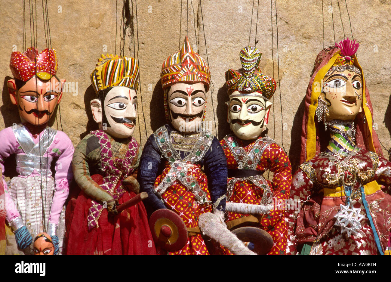 India Rajasthan Jaisalmer puppets for sale hanging on wall Stock Photo