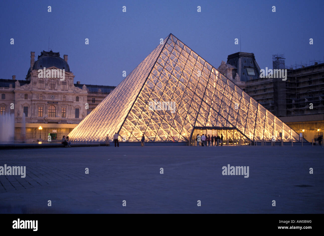 The Louvre Museum and the Louvre Pyramid Paris France Europe Stock