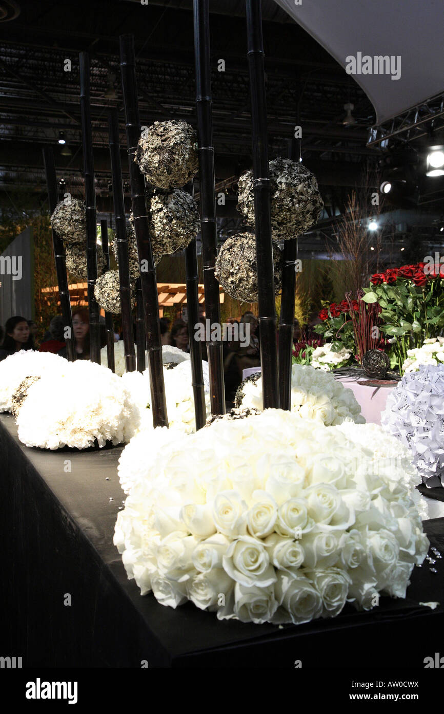 Flower Balls Display Balls Of White Roses And Black Bamboo Sticks
