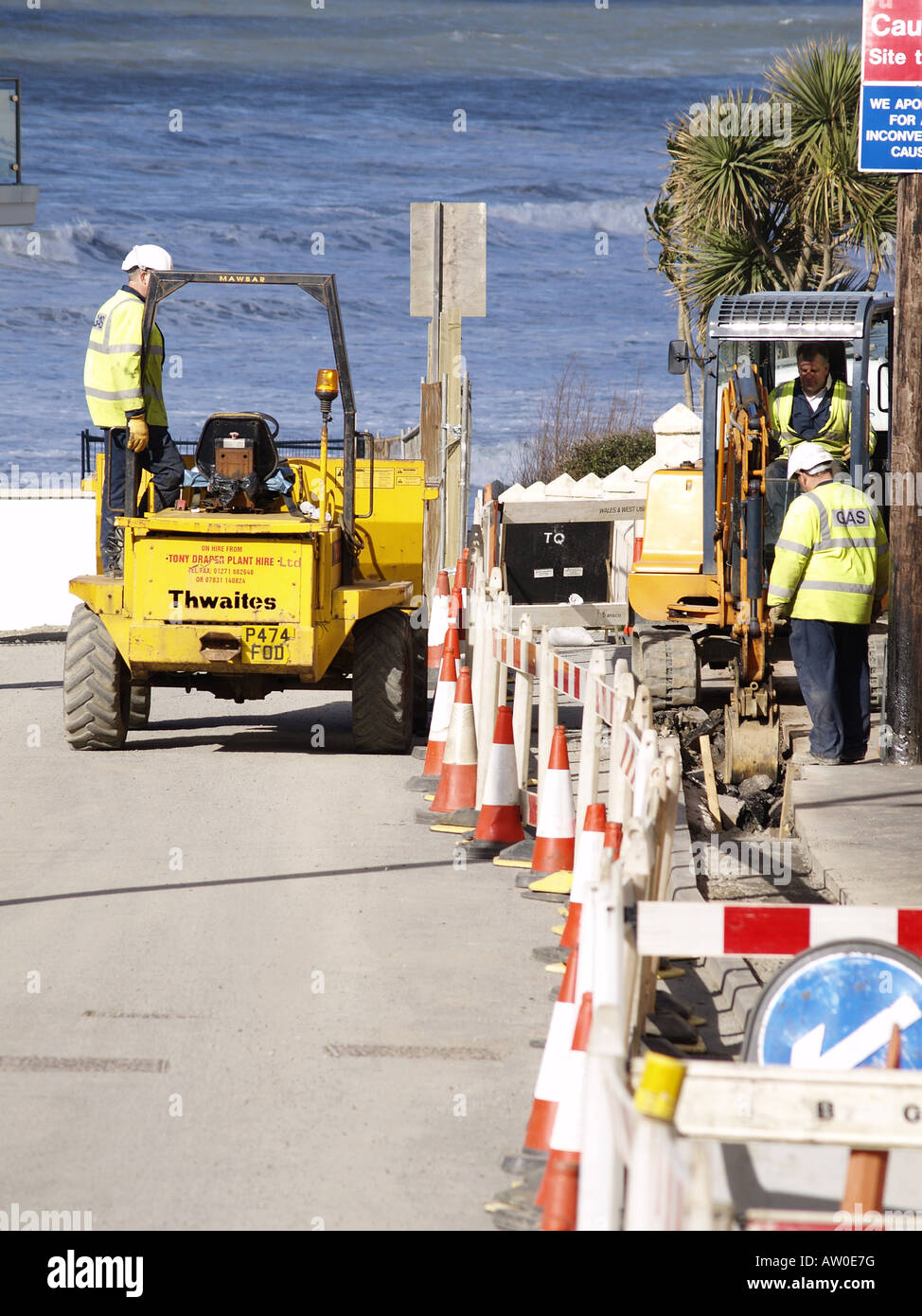 Gas company digging up the road Stock Photo Alamy
