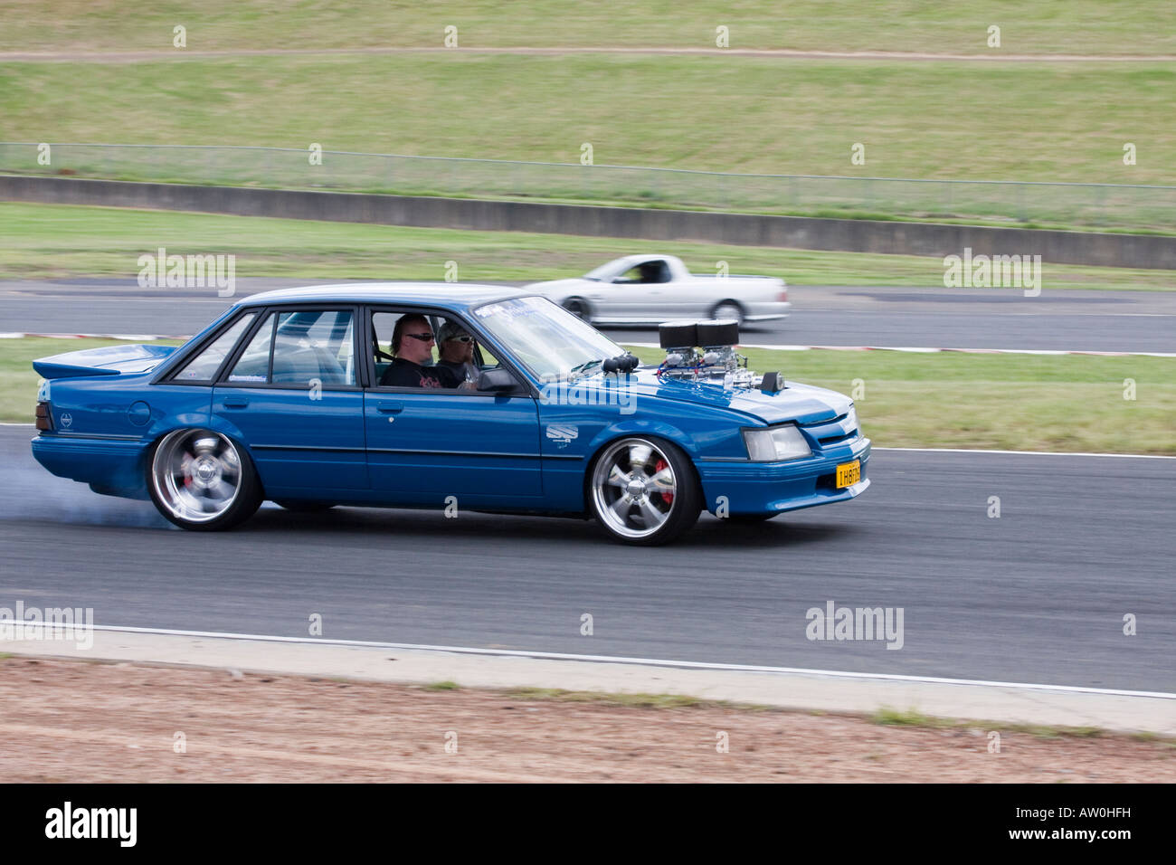 Supercharged Holden Commodore sedan on Eastern Creek racetrack in NSW