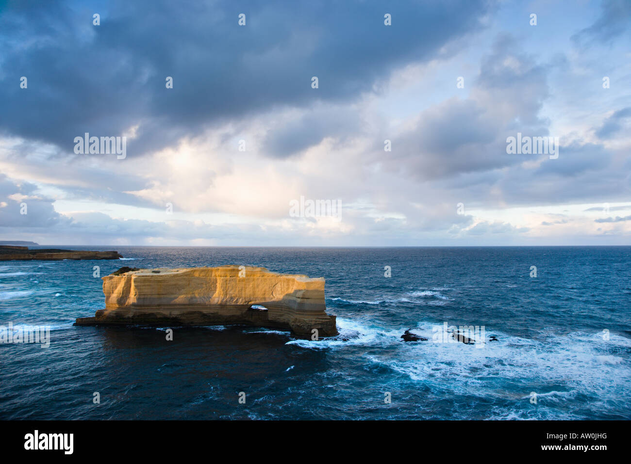 Rock formation in ocean Stock Photo - Alamy