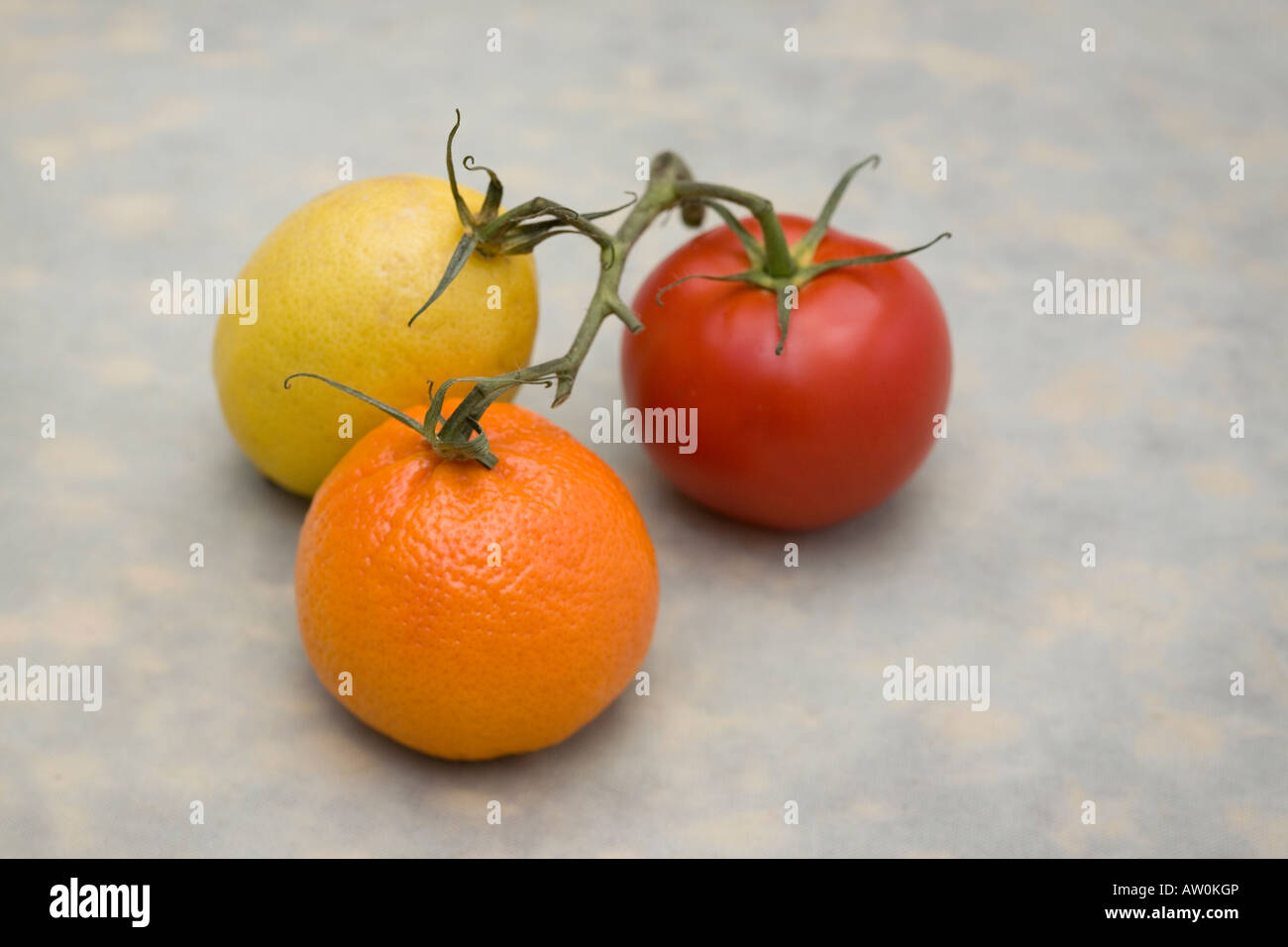 Download A Red Tomato Yellow Lemon And A Orange Manderin Fruit Are Connected Stock Photo Alamy PSD Mockup Templates