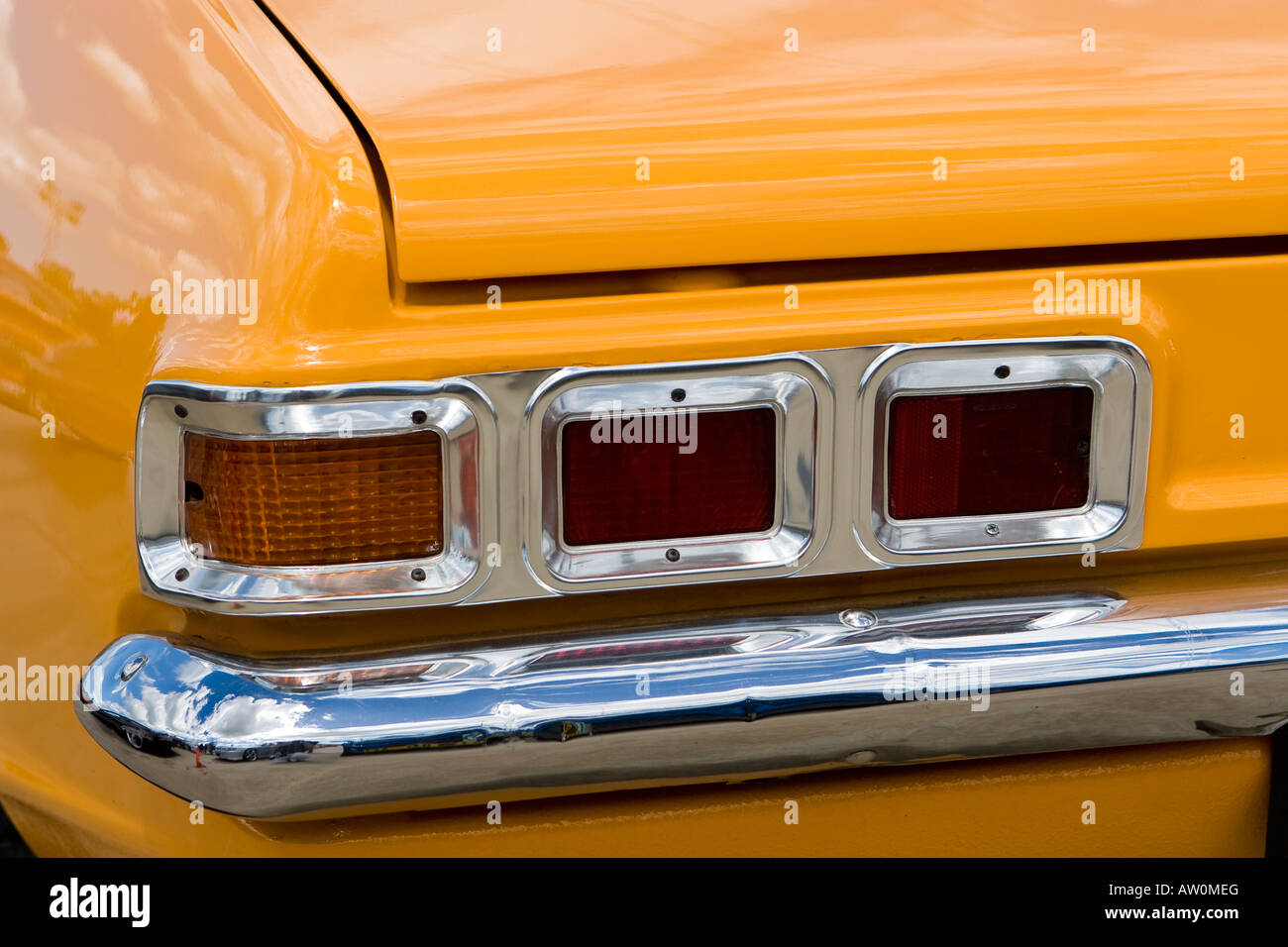 Closeup of car taillights and chrome bumper Stock Photo