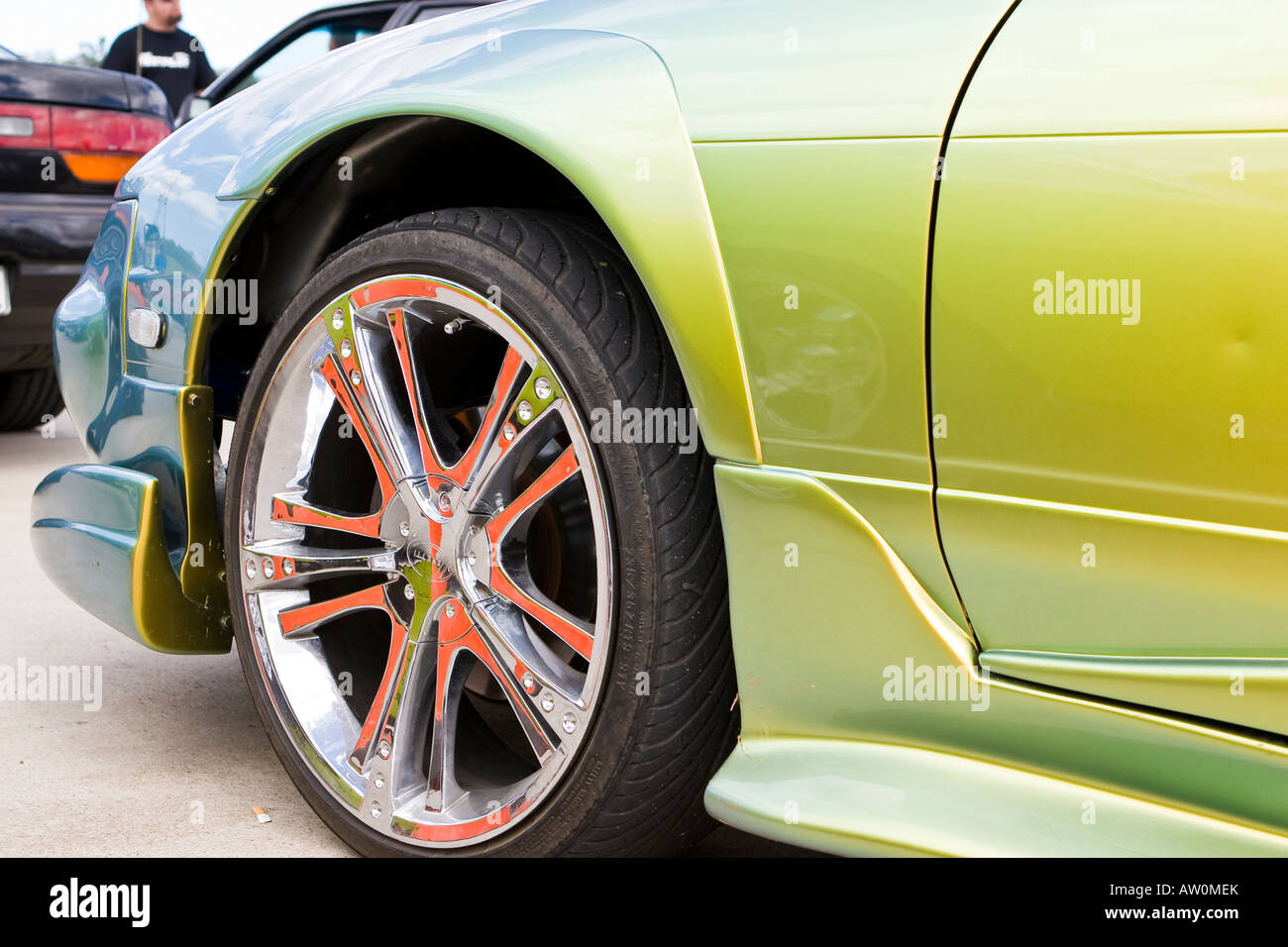 Close up of Chrome car front wheel and  mudguard Stock Photo