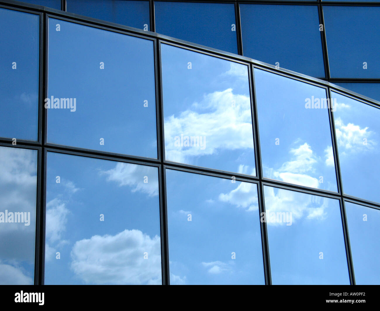 Blue Sky Reflections in Modern Glass Facade Stock Photo - Alamy