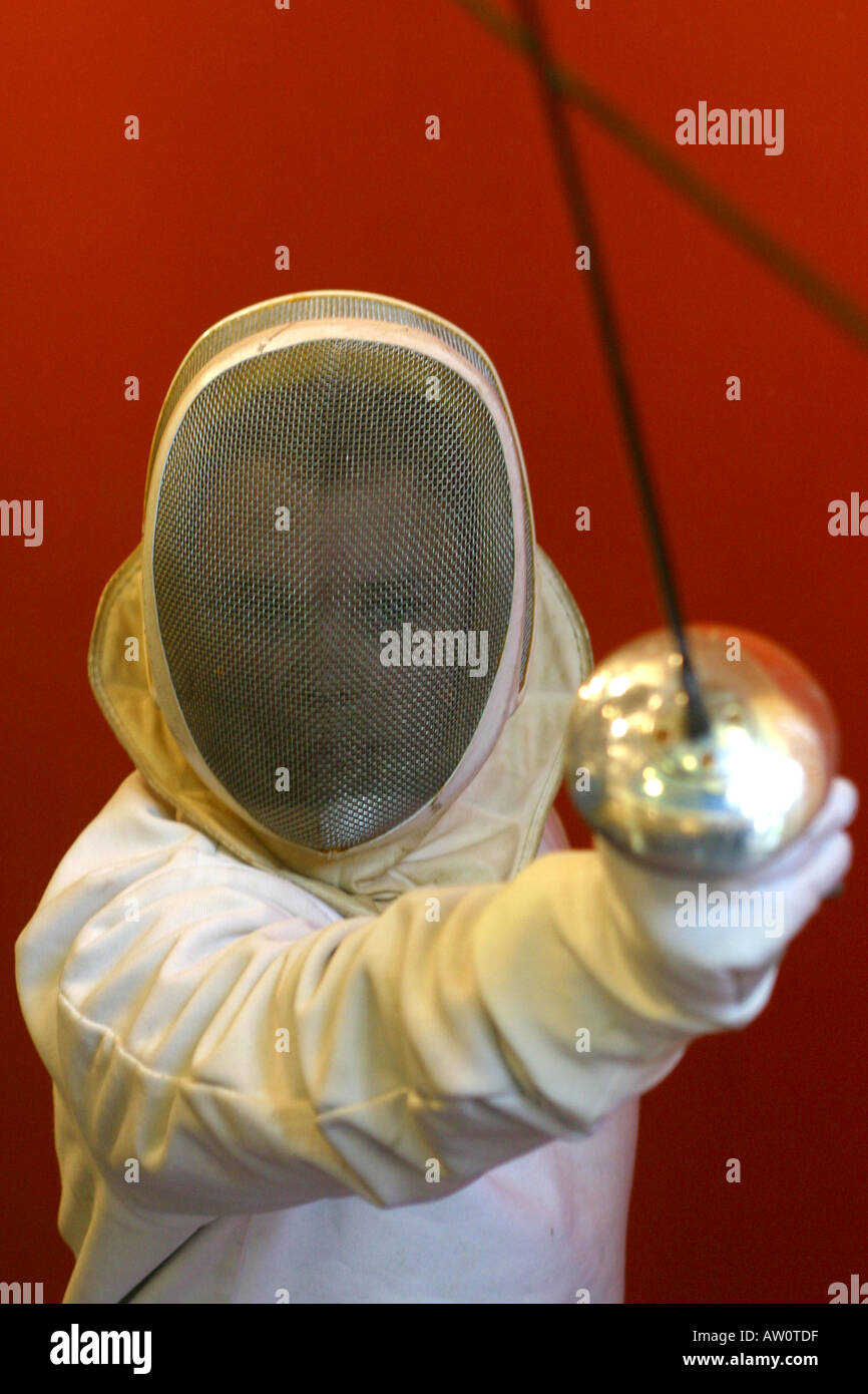 Teenage male fencer with epee Stock Photo Alamy