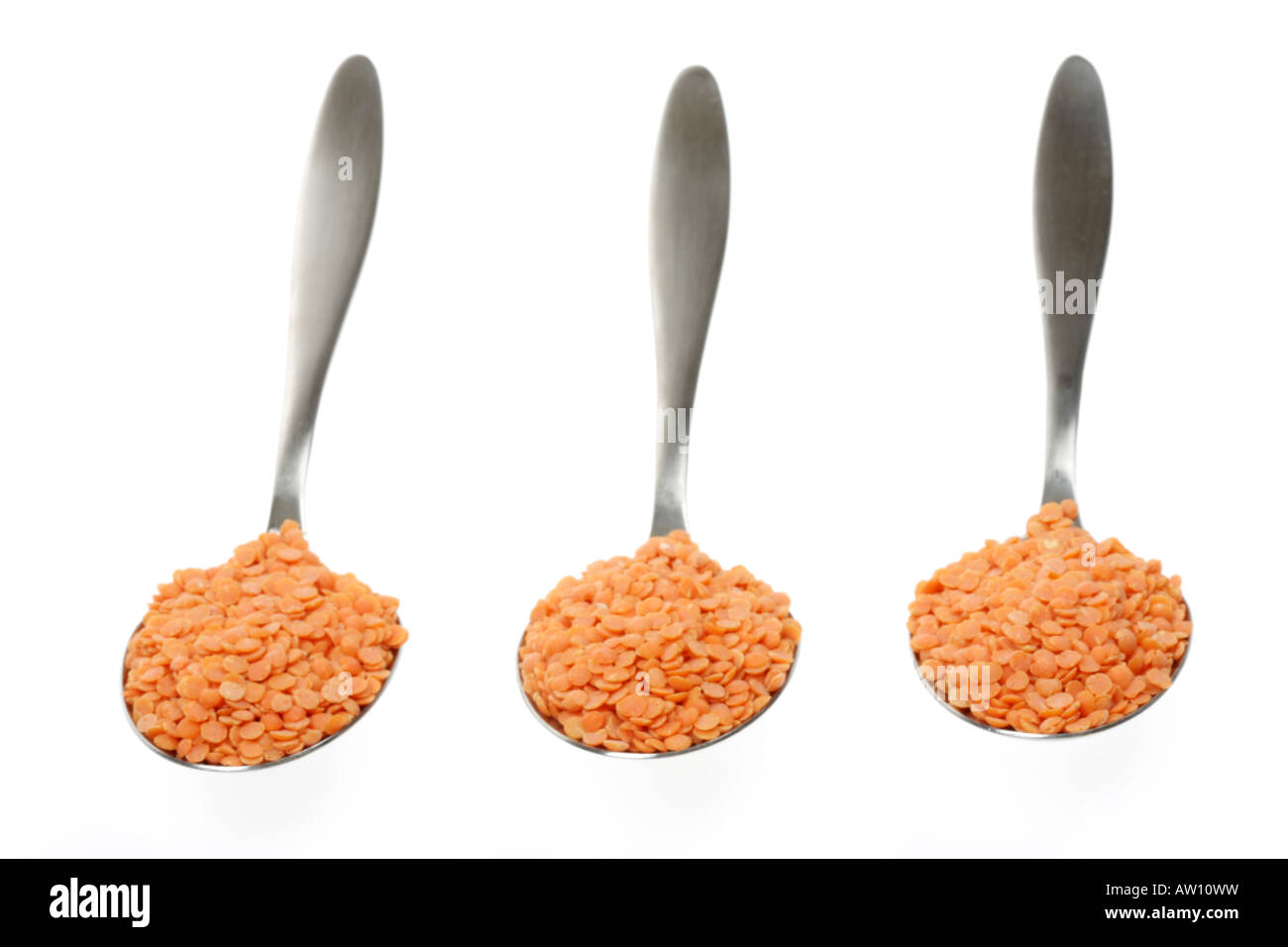 https://c8.alamy.com/comp/AW10WW/red-lentils-on-tablespoons-AW10WW.jpg