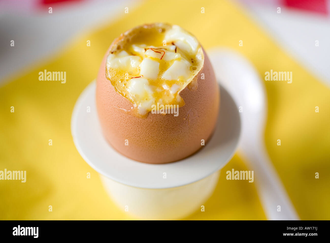 Softly cooked egg with safraan and olive oil Stock Photo Alamy