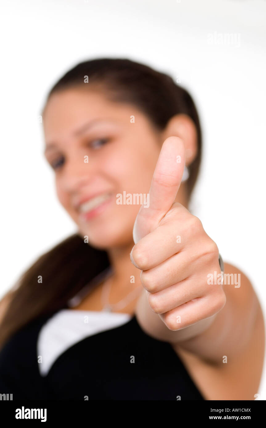Happy young teenage girl thumbs up smiling Stock Photo