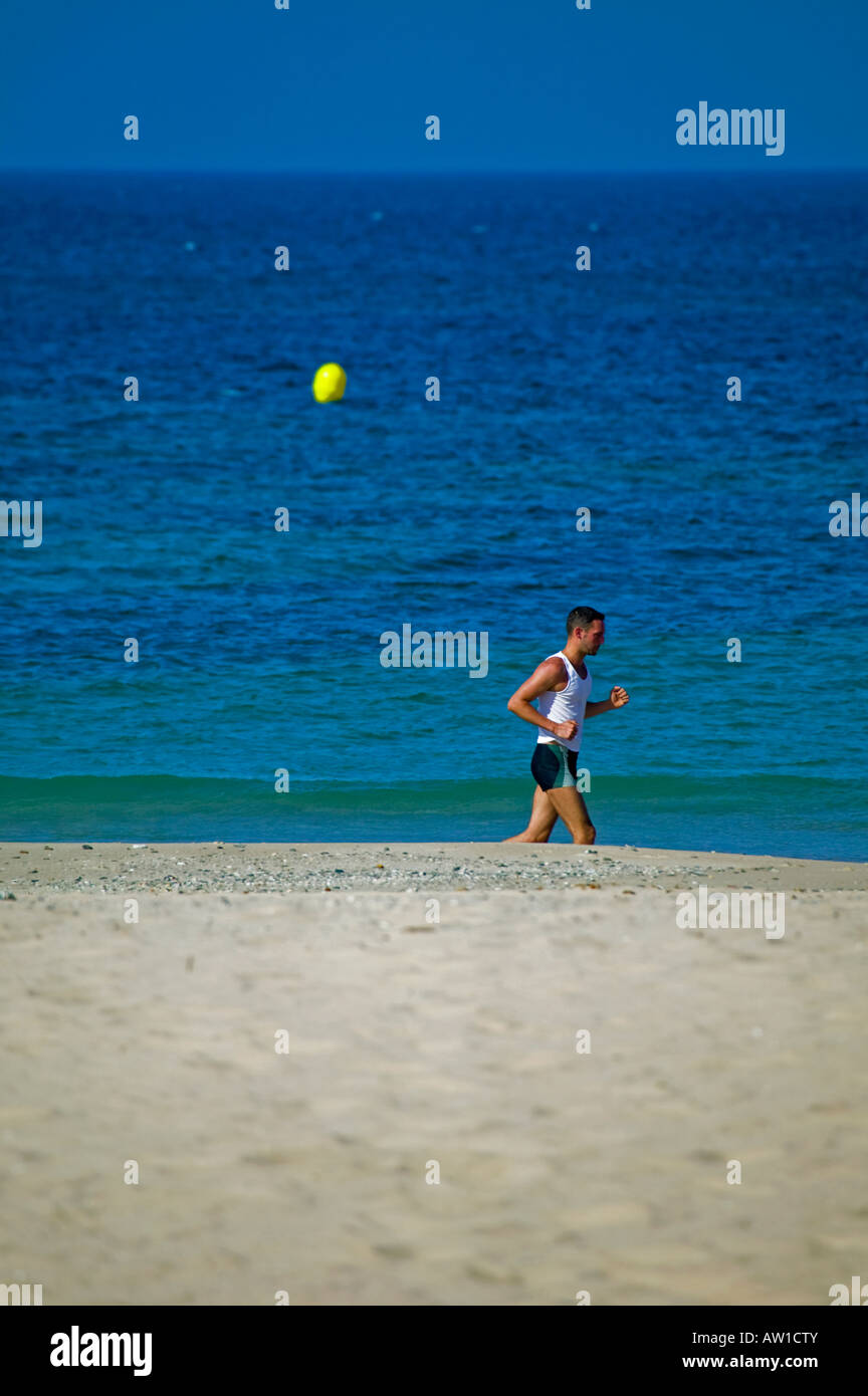 Jogger, Tarif Beach, Southern Spain, Europe Stock Photo