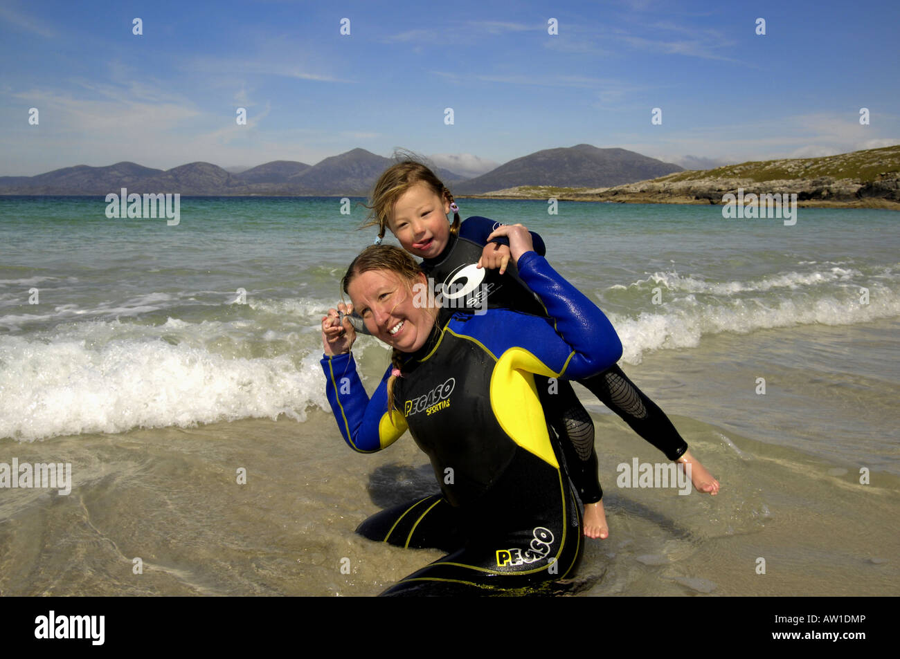Family beach scene sun sand sea Stock Photo - Alamy