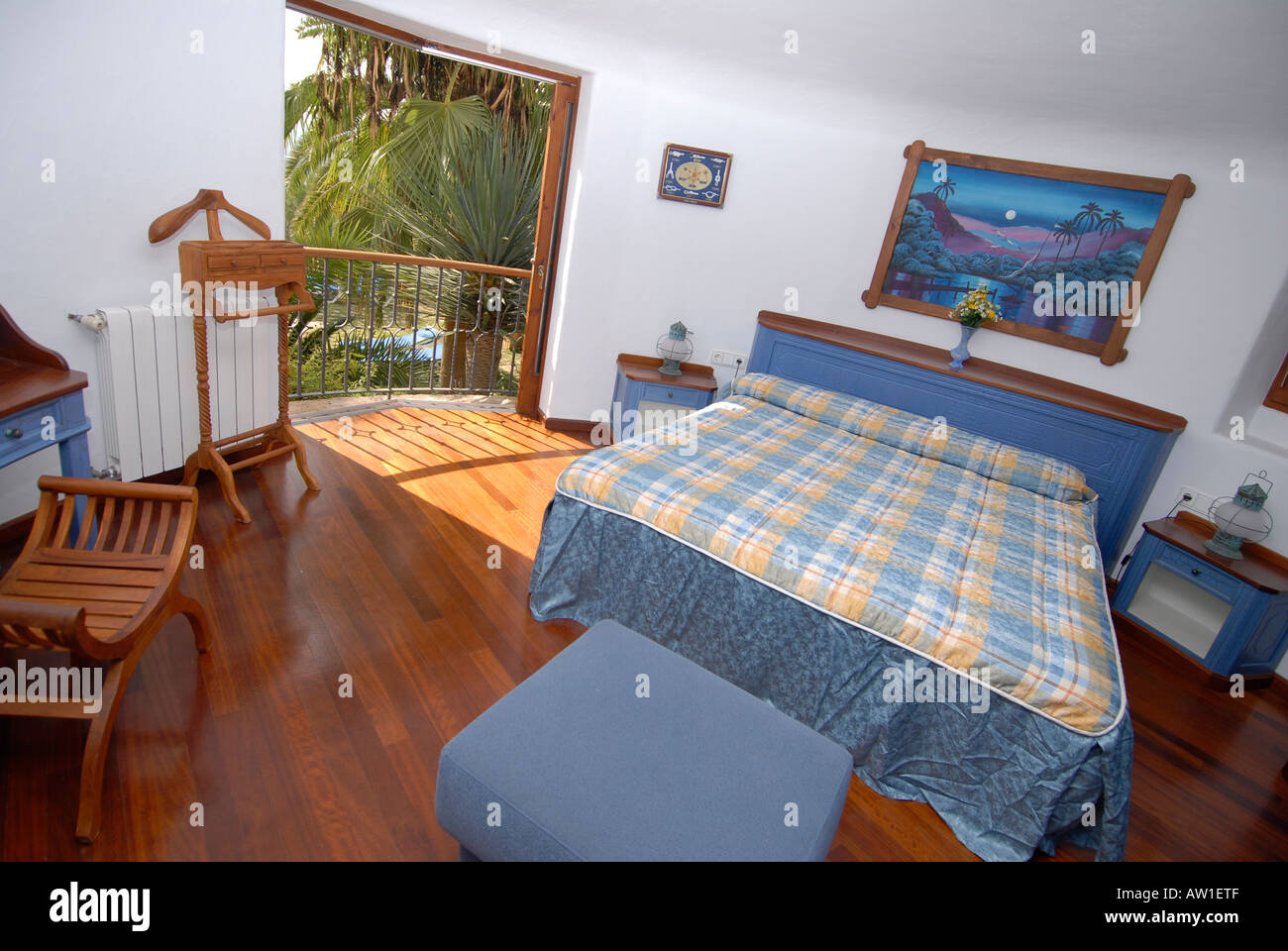 Blue And Wood Bedroom In Luxurious House For Rent In Ibiza