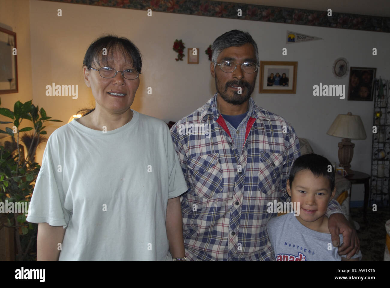 Inuit family at home Father mother and son Stock Photo Alamy